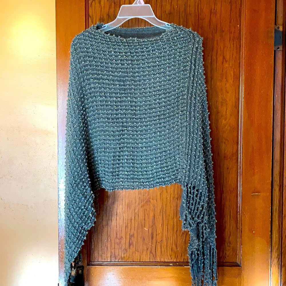 Grey and gold knit poncho with fringe
